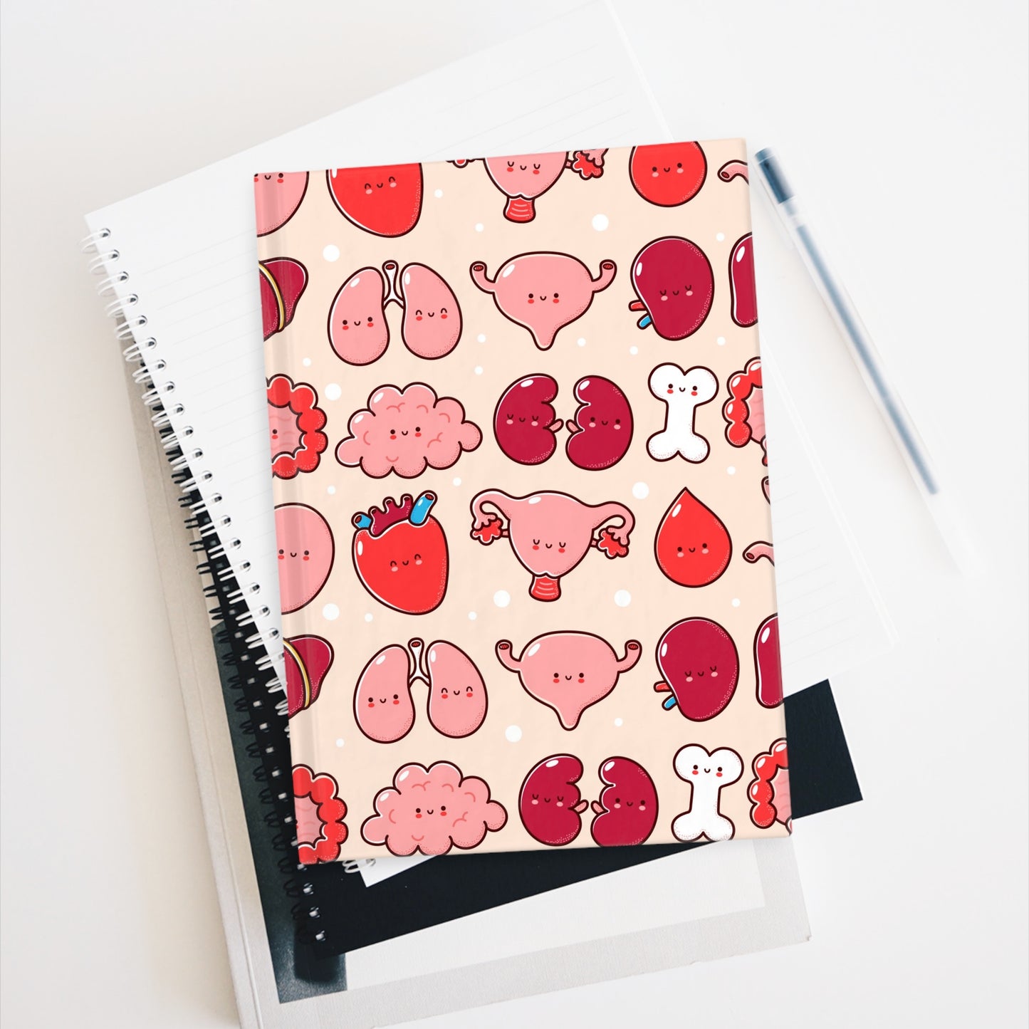 Cute journal with cartoon organ illustrations.